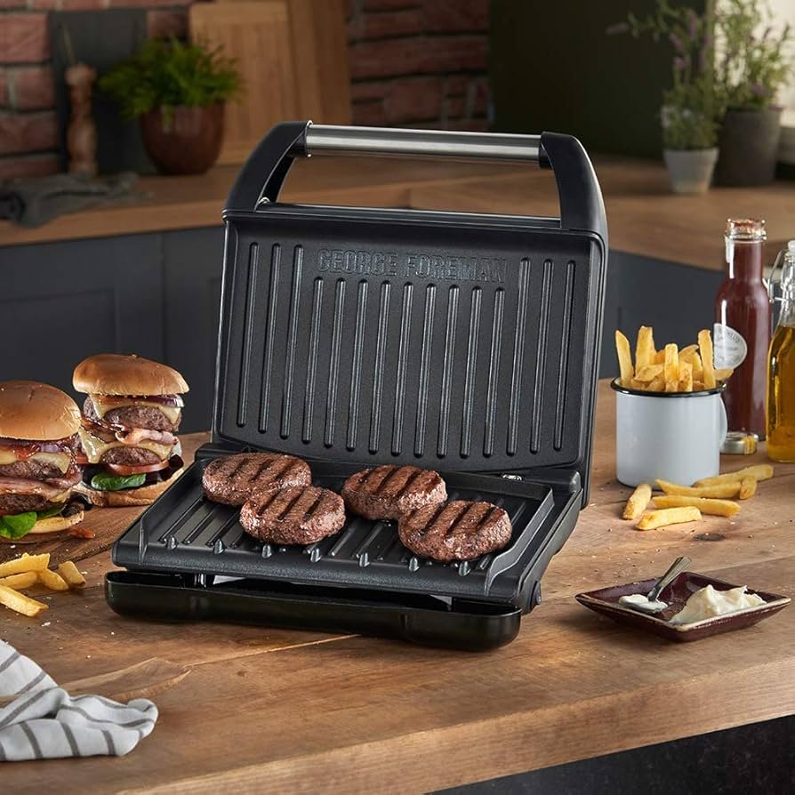 George Foreman 2-Serving Classic Plate Electric Indoor Grill compact black model for small kitchens and couples