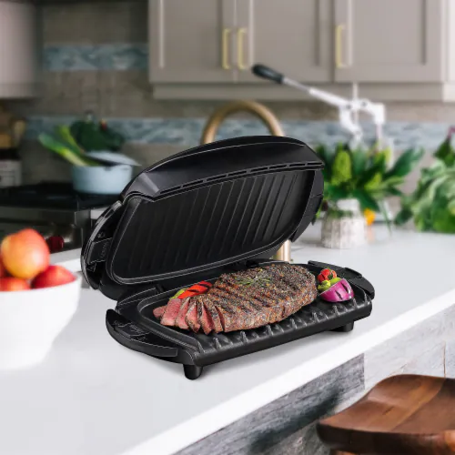George Foreman 4-Serving Removable Plate Electric Grill with dishwasher safe plates and drip tray